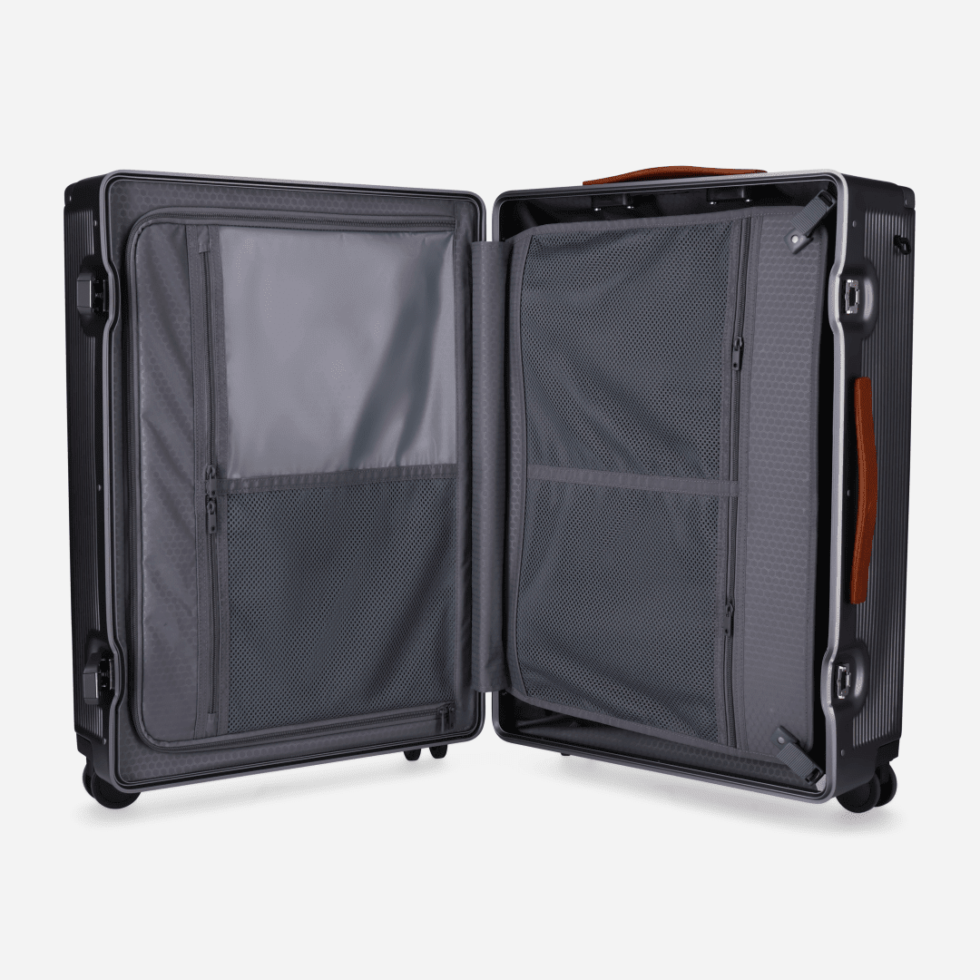 https://cdn.shopify.com/s/files/1/0855/2288/files/medium-check-in-67cm-70-lmedium-check-in-trolleyjekyll-hidesilver-455880.png?v=1776978190